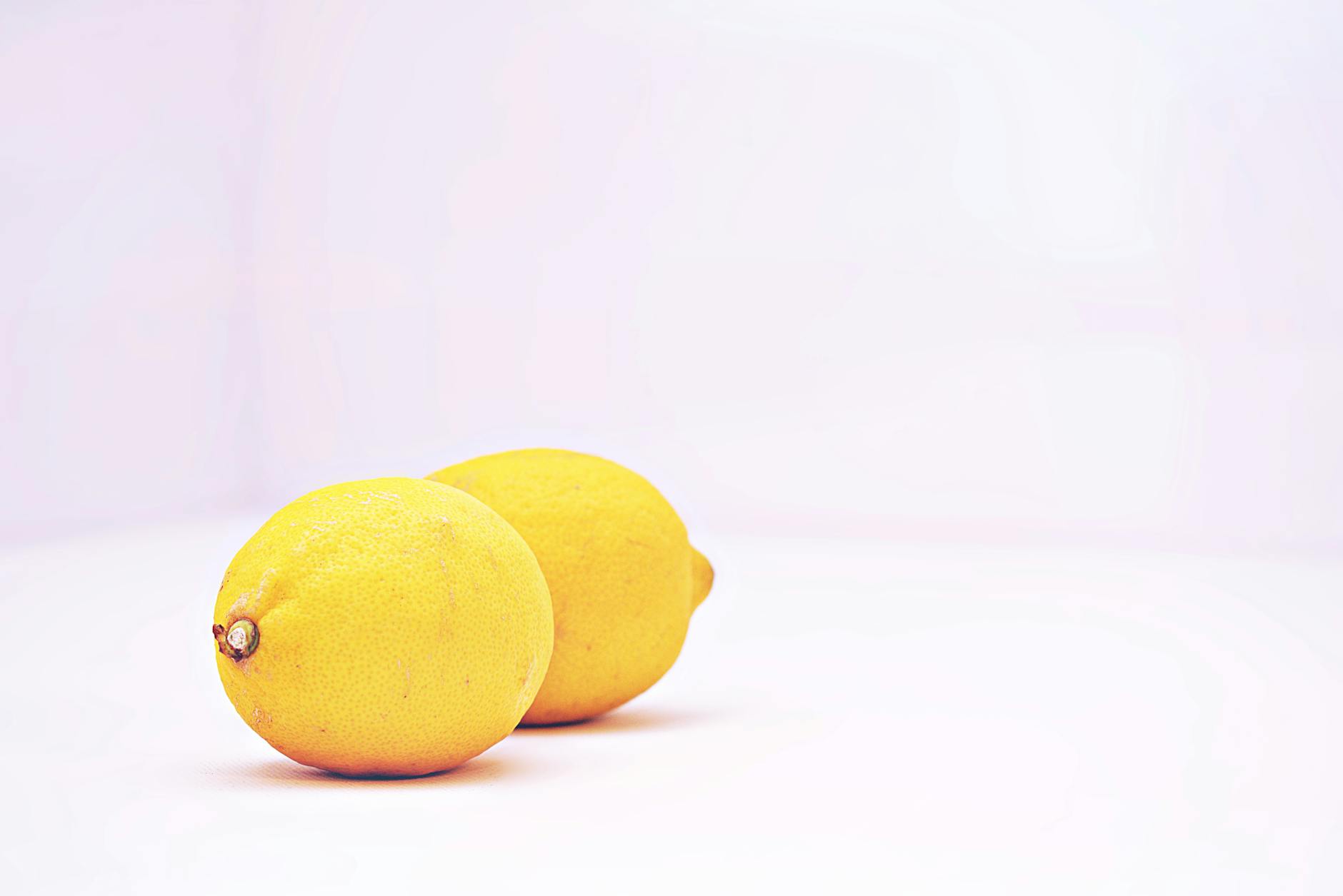 Fresh lemon on white background, symbolizing the lemon vibrator technology