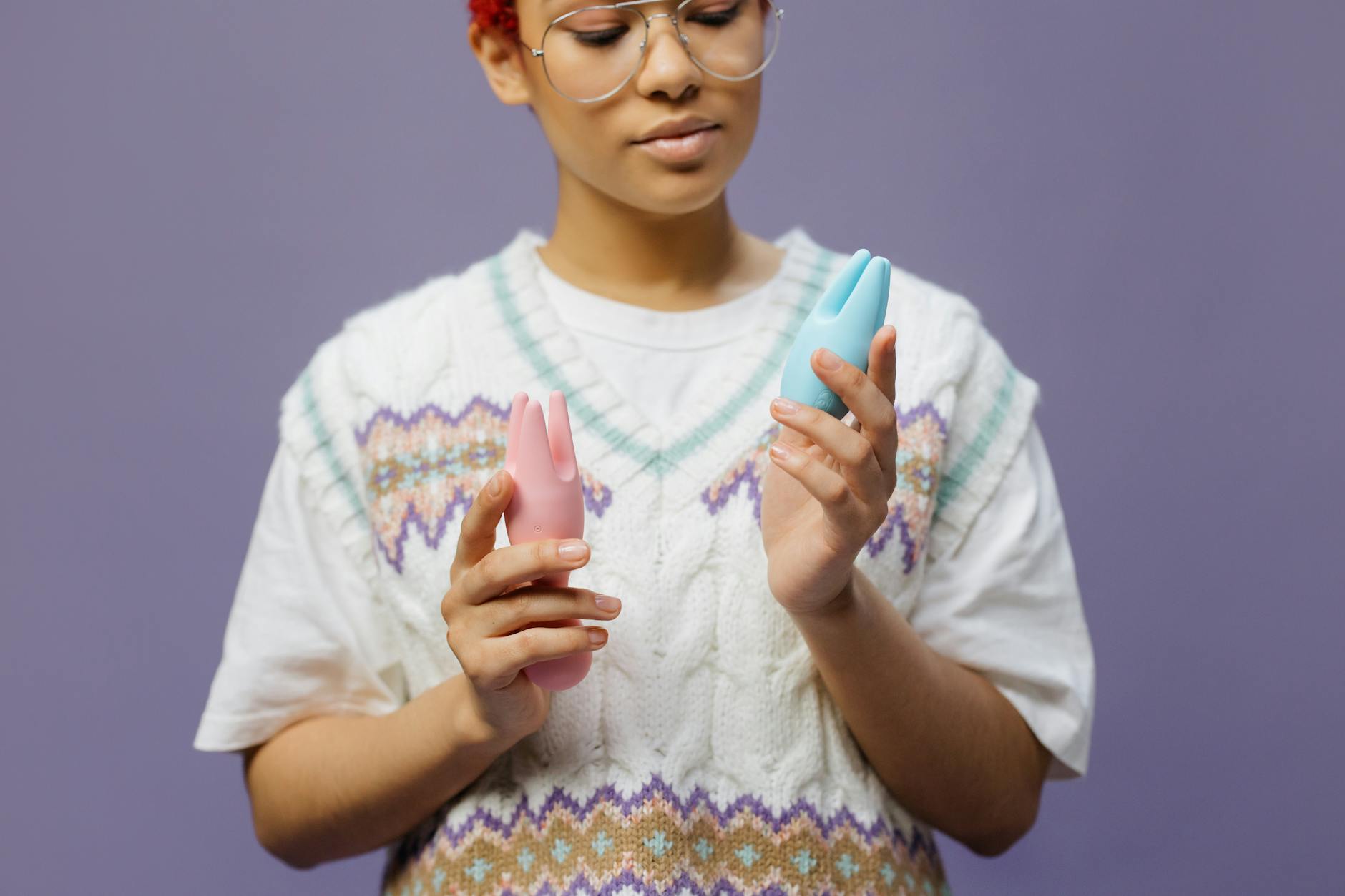 Woman holding lemon clitoral vibrators and reconnecting with solo pleasure after relationship ends